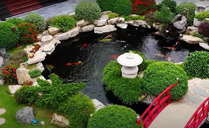 Landscaped koi pond with circulating water